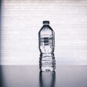 clear drinking bottle filled with water